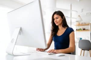 Business woman working on laptop from home office